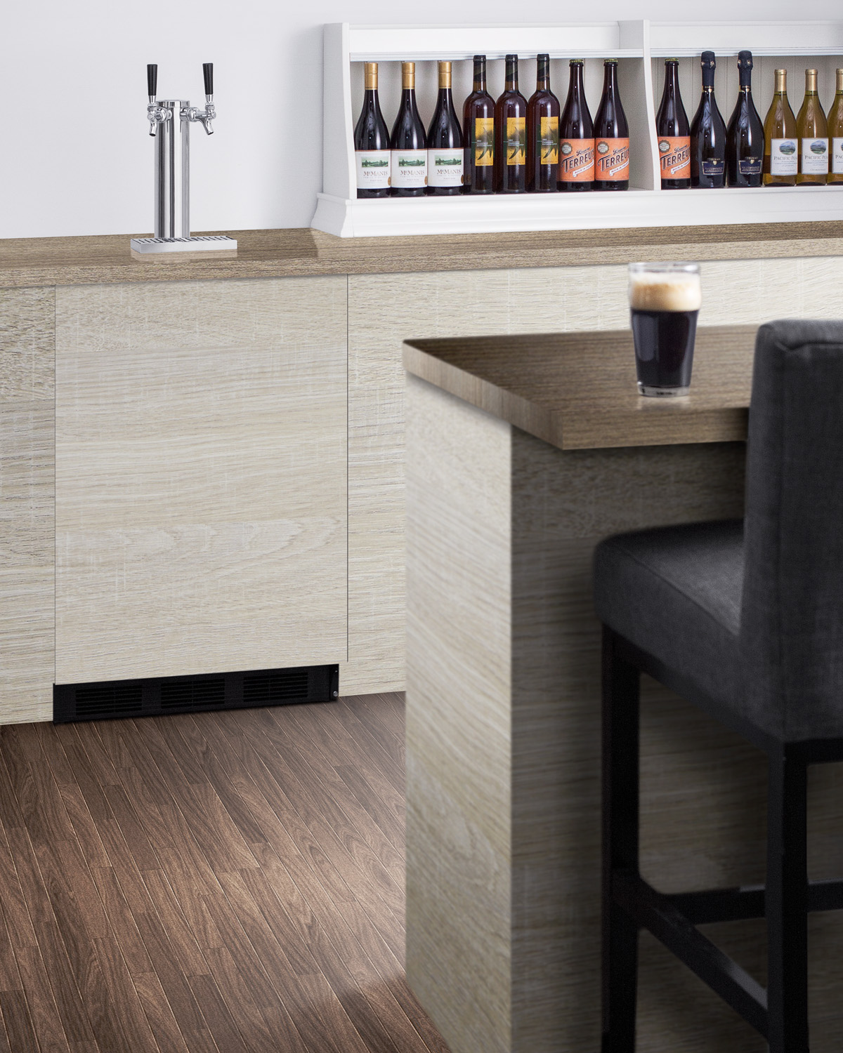 Built-in undercounter ADA height commercially listed dual tap beer dispenser with stainless steel wrapped door and black cabinet